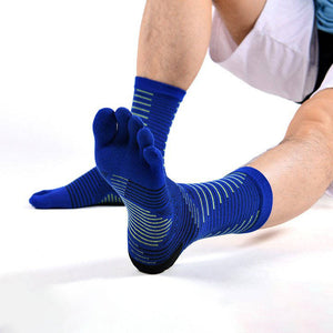 Athlete stretching in blue five-toe socks with neon green grip lines.
