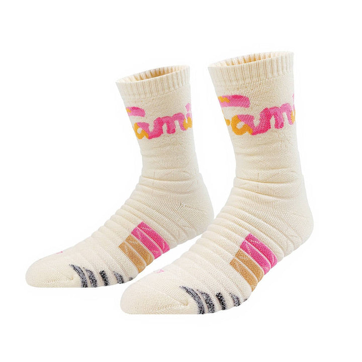 Beige crew socks with pink and yellow 'fun' script and striped details on the toes, on a white surface.