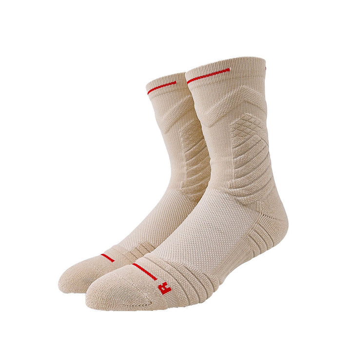 Beige crew socks with red stripes and a cross symbol on the ankle, displayed on a white background.