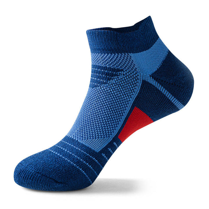 blue ankle sock with a white patch on the foot arch, isolated on a white background.