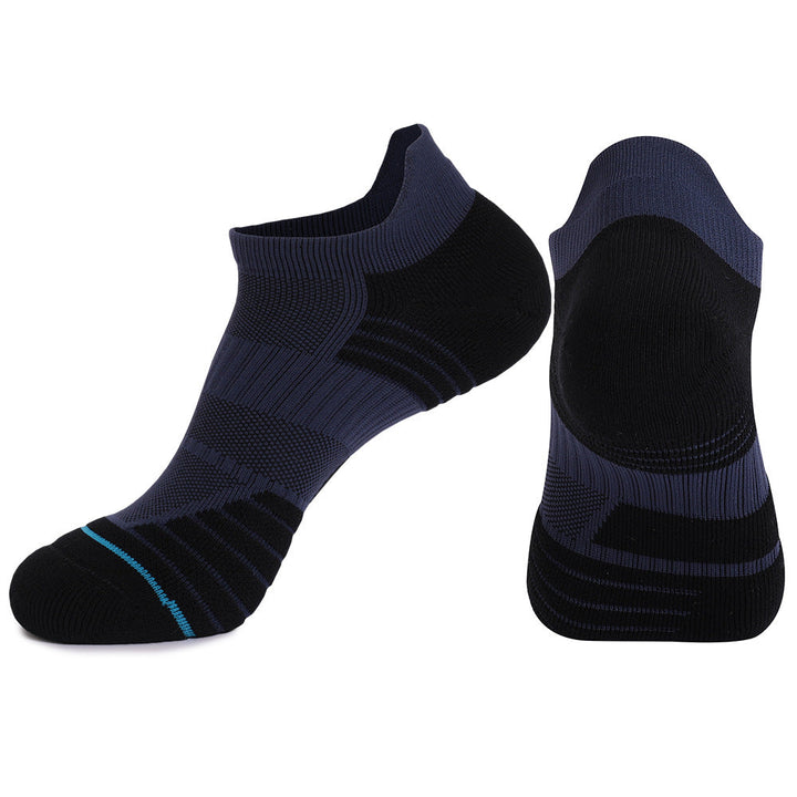 Pair of dark blue basketball socks with light blue accents.