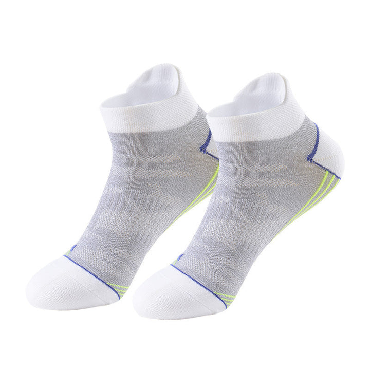 Gray and white ankle socks with blue and lime green accents.