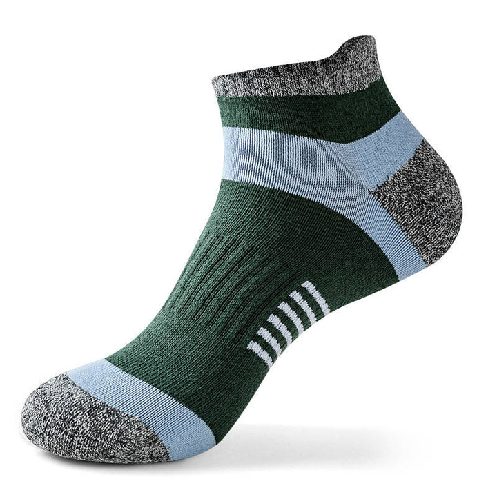 Green ankle sock with blue horizontal stripes and grey reinforced heel and toe regions.