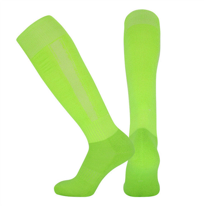 A pair of green knee-high compression socks displayed against a white background.