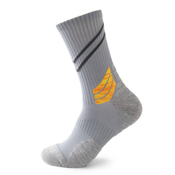 Grey sports sock with orange wing-like pattern and black accent stripes, against a white backdrop.