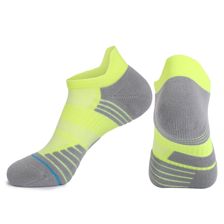 Pair of neon green and grey basketball socks with blue accents.