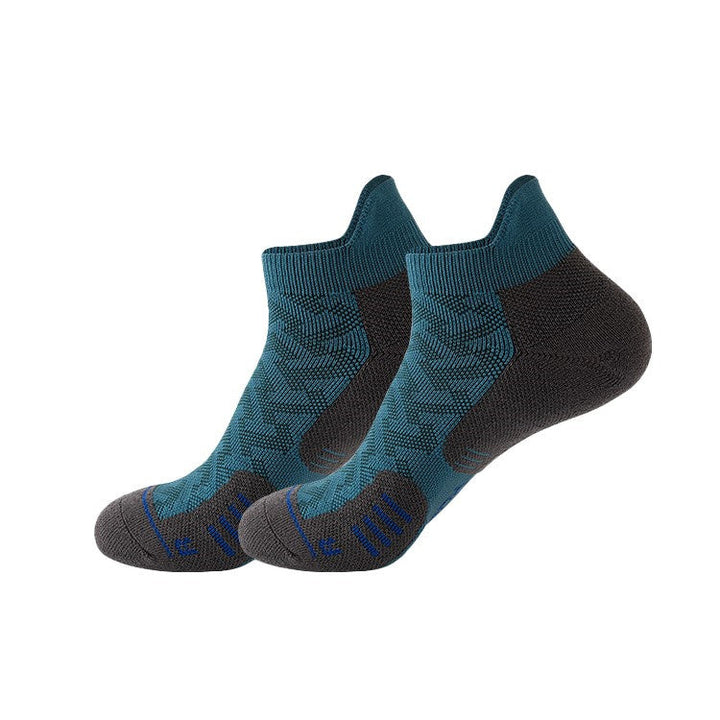 Teal blue ankle socks with dark grey cushioning and blue accents.