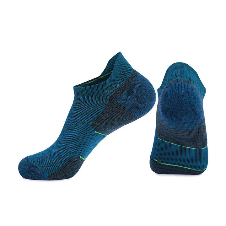 Pair of teal sports socks with dark blue accent lines isolated on a white background.