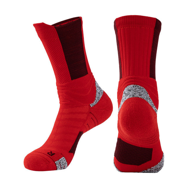 Pair of vibrant red basketball socks with reinforced heel and toe areas, and compression arch support.