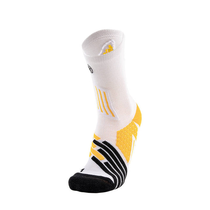 White basketball sock with yellow graphics and black stripes on the toe, displayed against a white background.