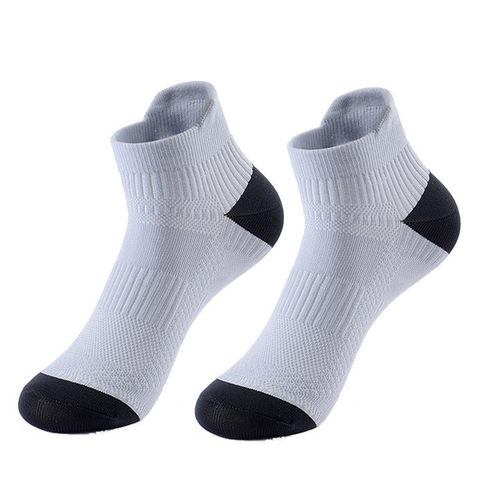 White ankle socks with black heel and toe caps.