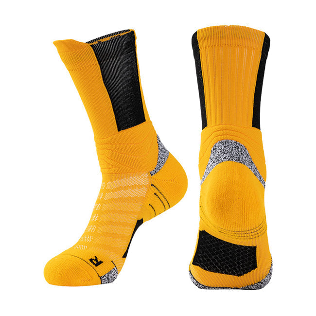 Pair of bright yellow basketball socks with black elastic bands, cushioned zones, and breathable panels.